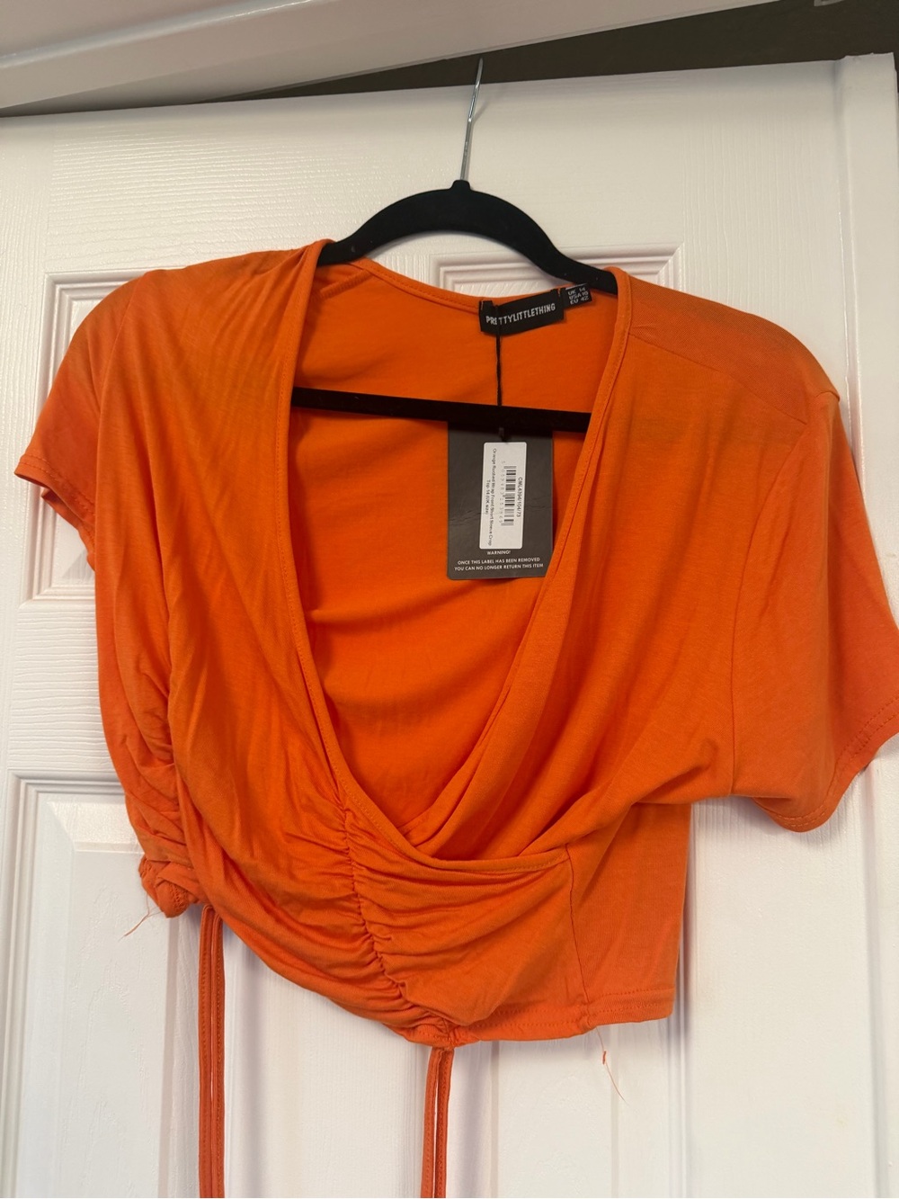 PrettyLittleThing Orange Ruched V-Neck Crop Top